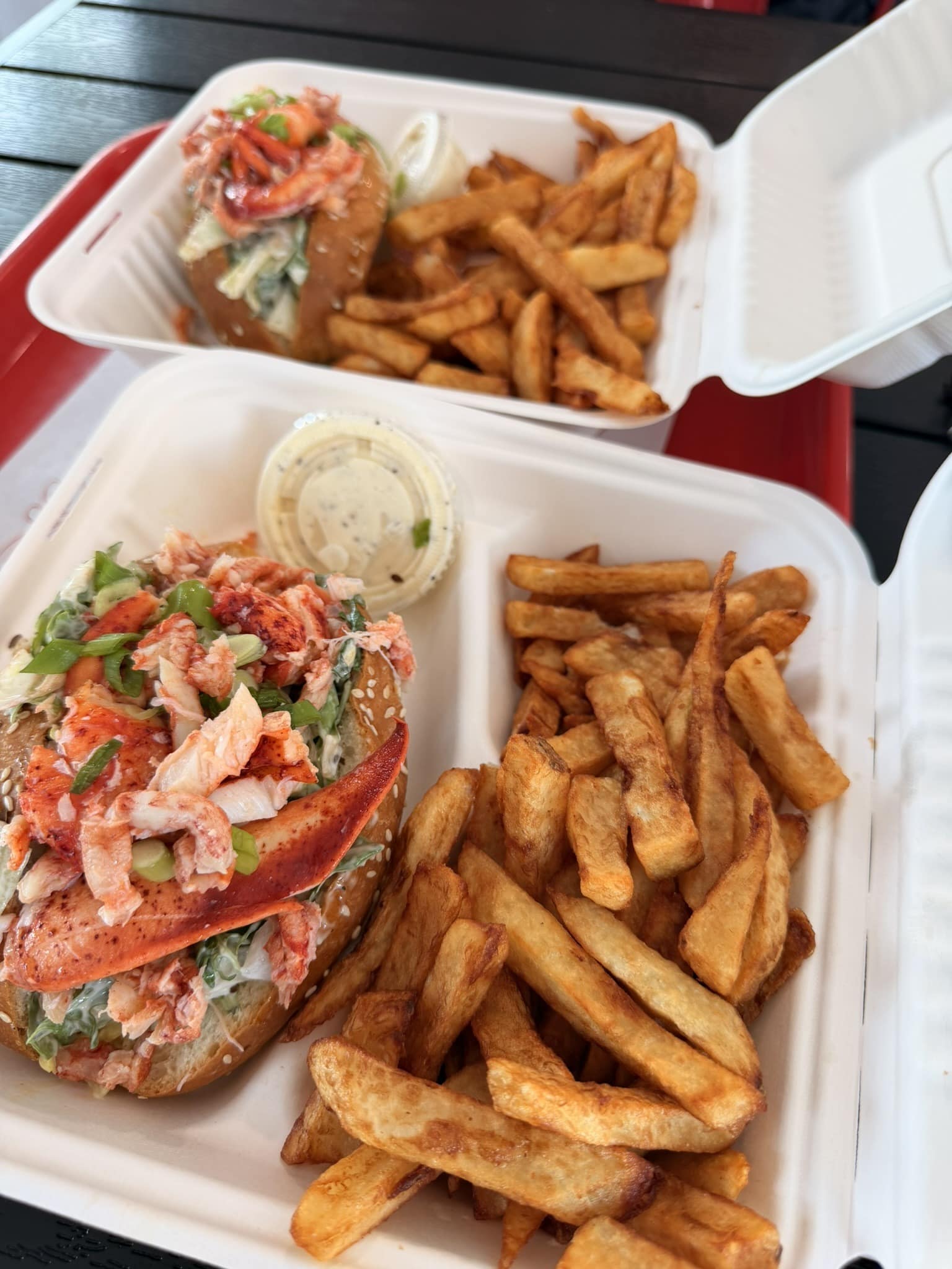 Road trip au Québec : itinéraire de 2 semaines de Montréal à la Gaspésie Guédille au homard dégustée à Baie-Saint-Paul sur la route de Tadoussac